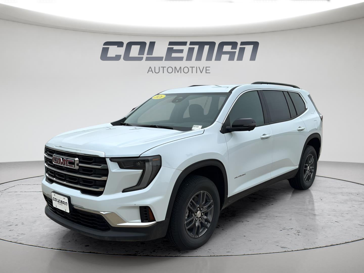 2026 GMC Acadia Elevation in Glacier White Tricoat — front three-quarter view