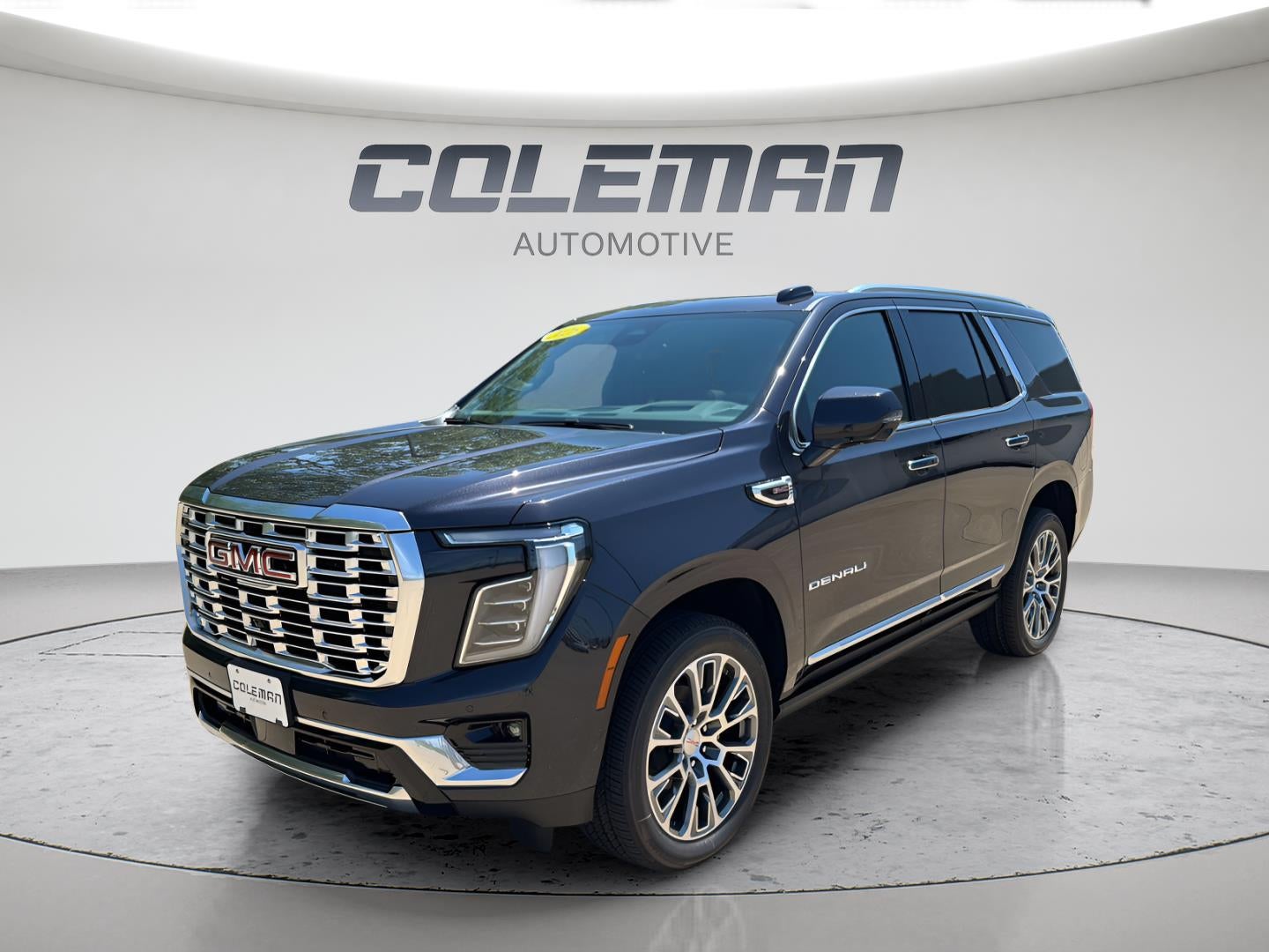 2026 GMC Yukon Denali in Titanium Rush Metallic — front three-quarter view