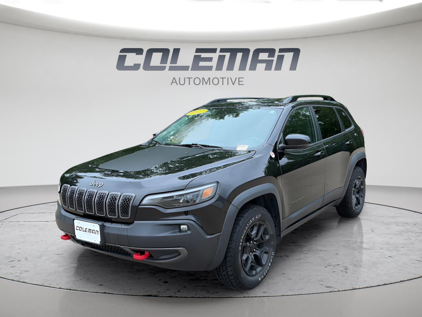 2022 Jeep Cherokee Trailhawk 4x4 in Black — front three-quarter view