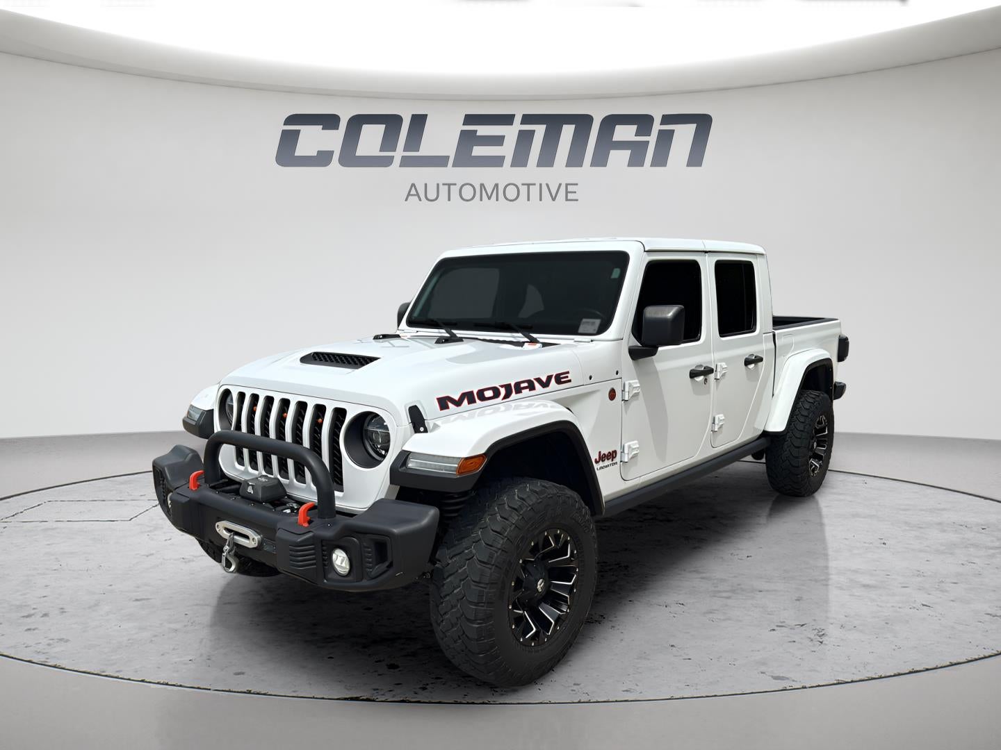 2021 Jeep Gladiator Mojave 4x4 in Bright White Clearcoat — front three-quarter view