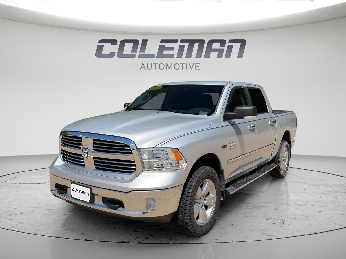 2015 RAM 1500 Big Horn in Bright Silver Metallic Clearcoat — front three-quarter view