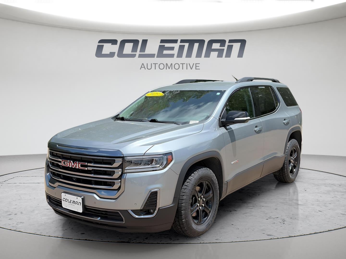 2023 GMC Acadia AWD AT4 in Sterling Metallic — front three-quarter view