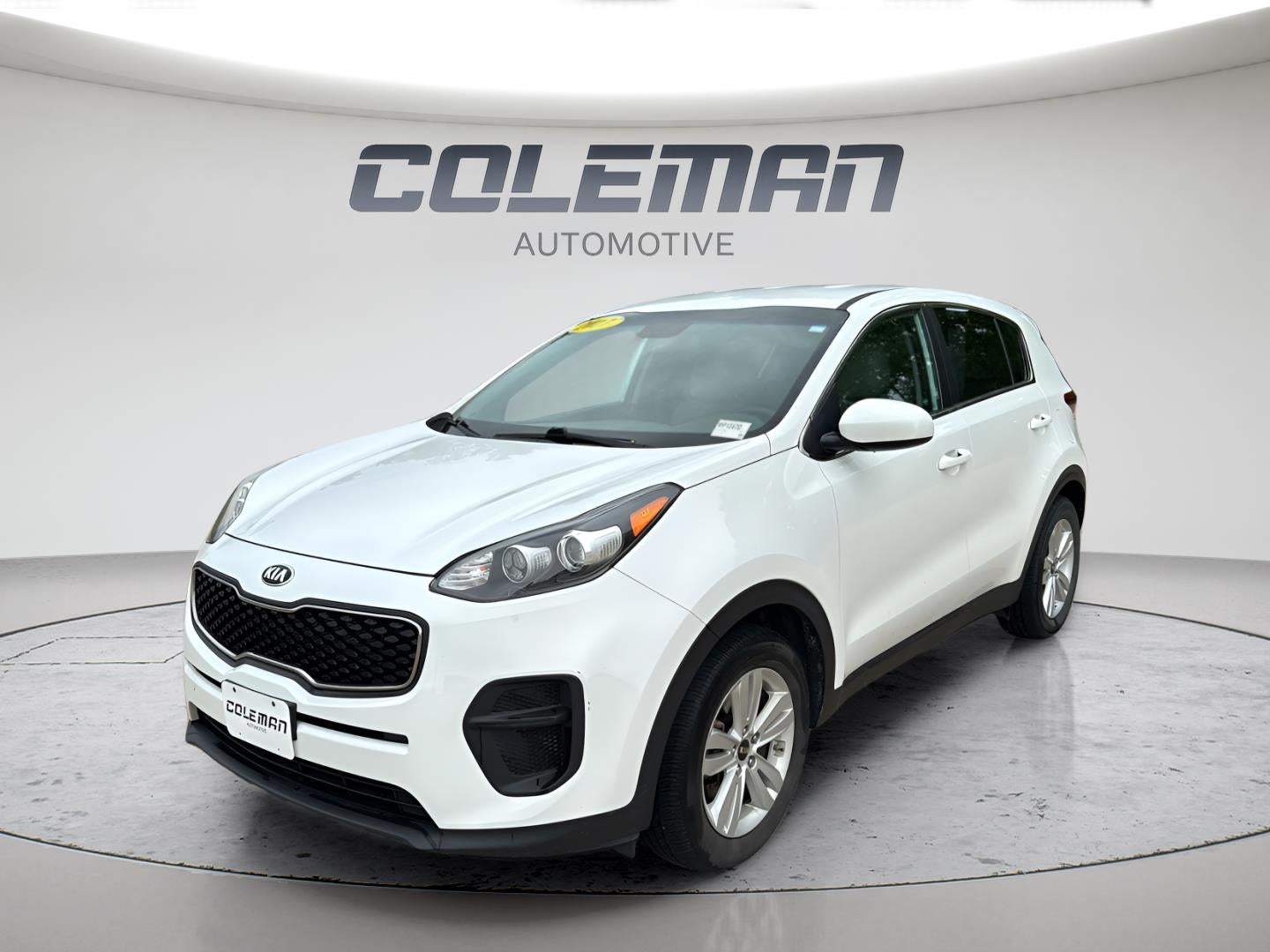 2017 Kia Sportage LX in Clear White — front three-quarter view